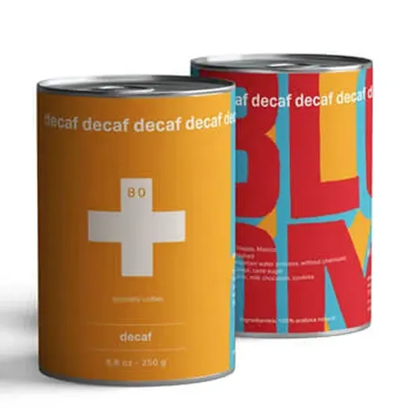 Café descafeinado Sugarcane EA de Colombia en dos envases cilíndricos de colores de 80plus