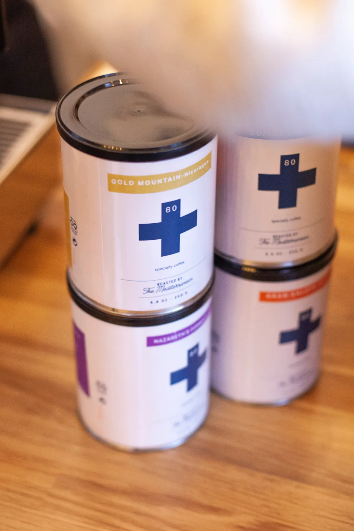 80plus specialty coffee aluminium cans designed to preserve coffee freshness