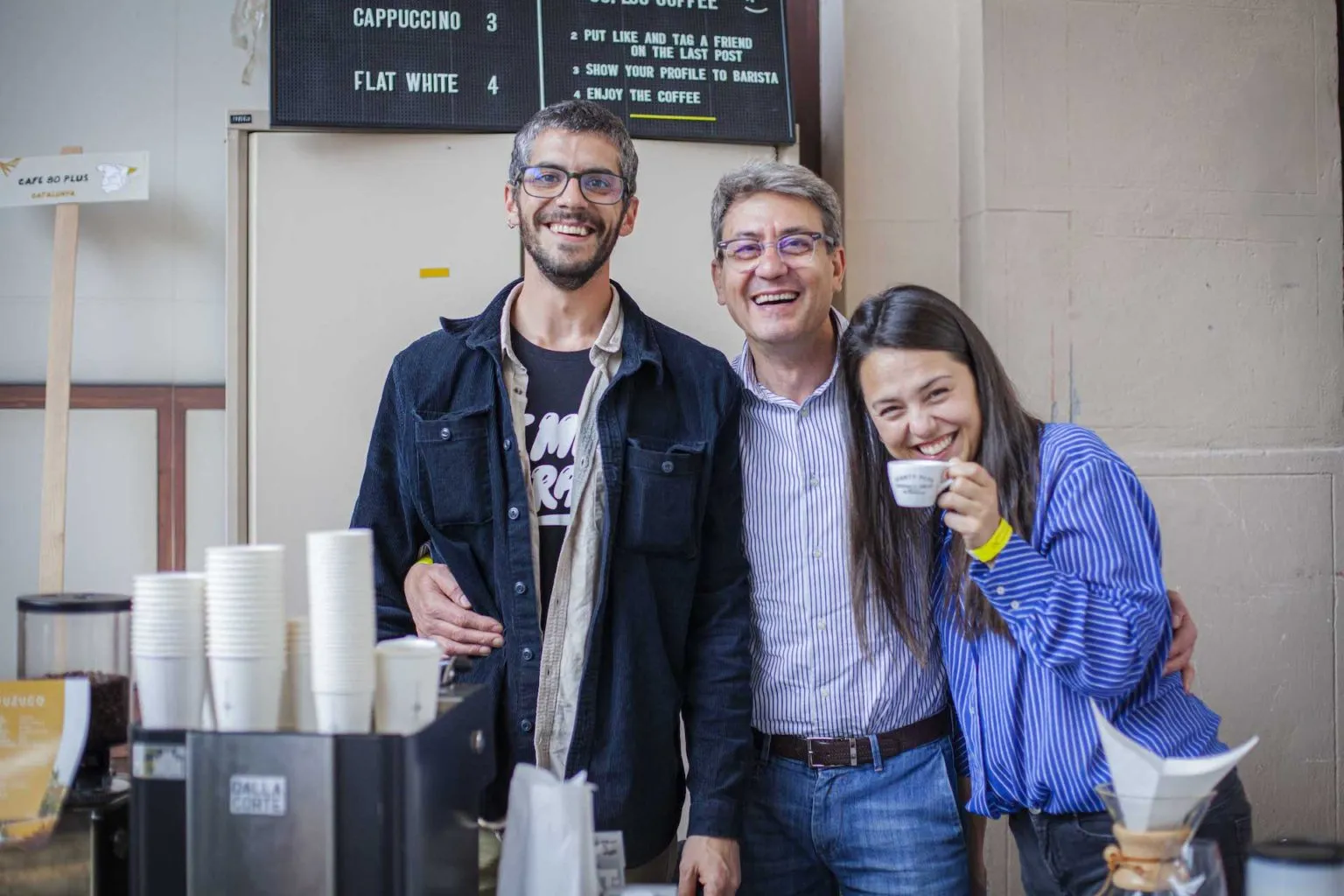 Three members of the 80plus team together at a coffee event