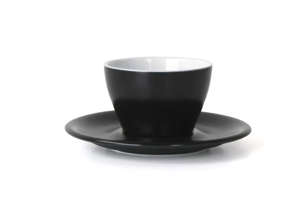Black notNeutral Meno cappuccino cup with white interior and matching black saucer